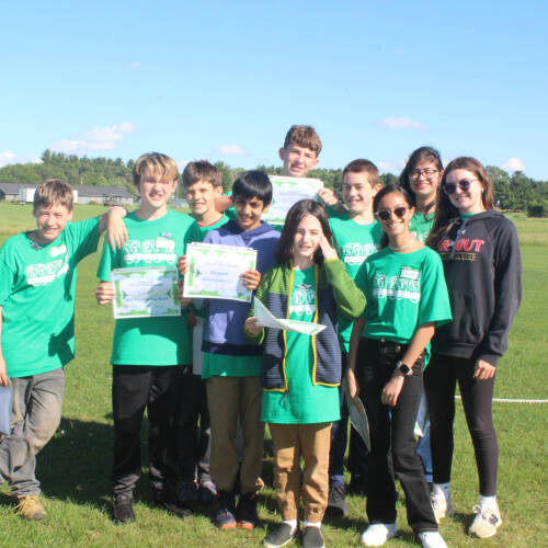 Group of middle school students hold the certificates they earned at STEPS camp